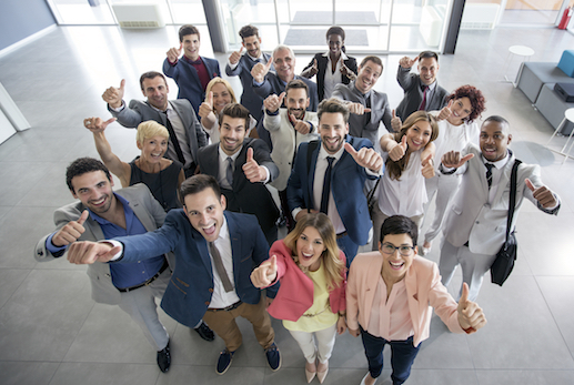 Portrait of smiling group of diverse people giving thumps up istock copy